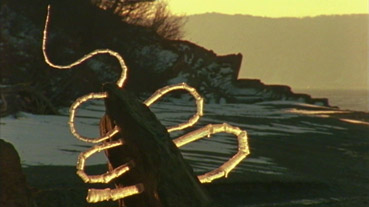 Ice Sculpture by Andy Goldsworthy.  You can see the process of him creating this sculpture in his documentary Rivers and Tides.